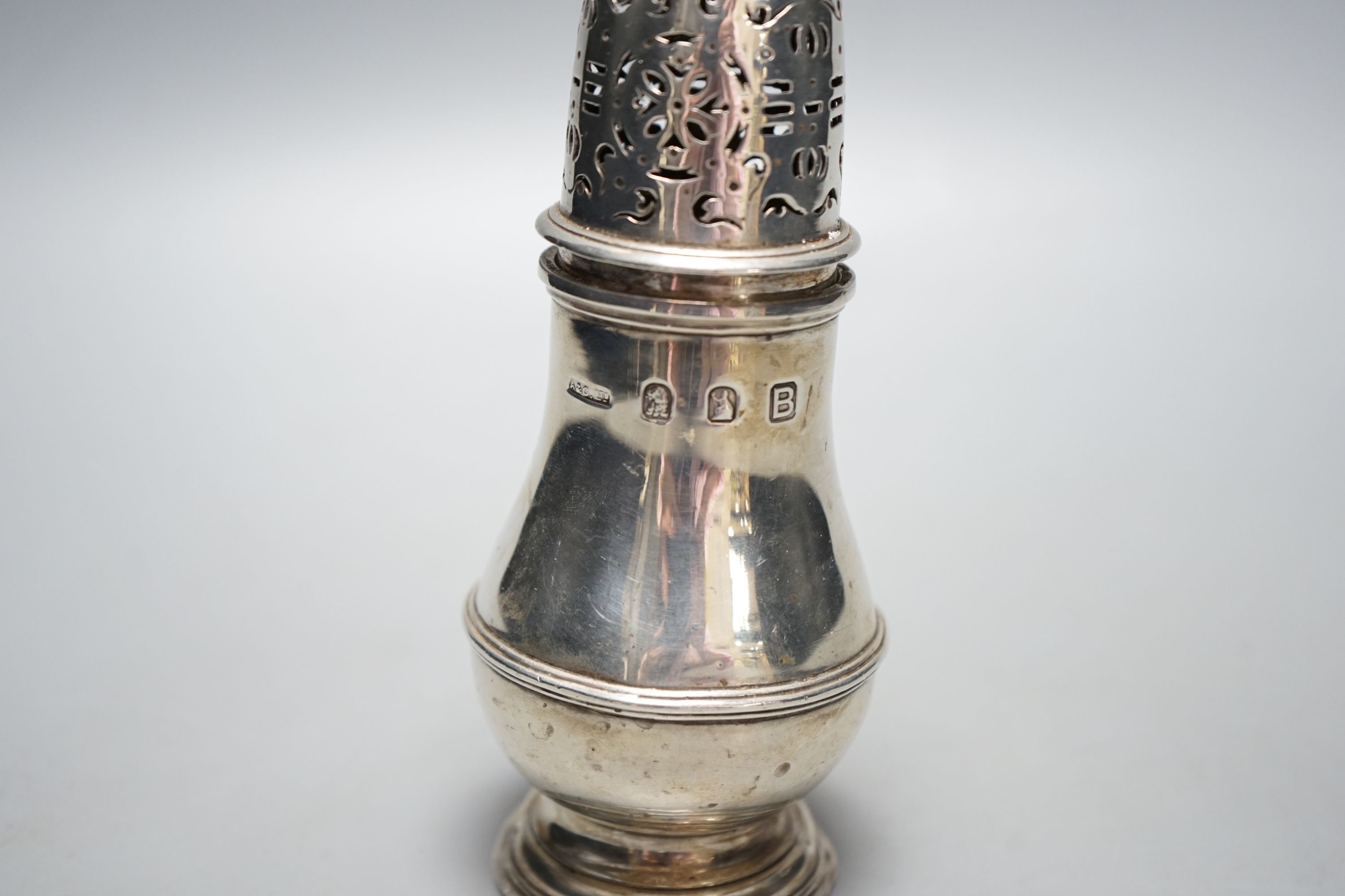 A George VI Brittania standard silver sugar caster, by Asprey & Co, London, 1937, 15.5cm, 179 grams.